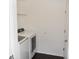 Laundry room with Samsung washer and dryer set at 1051 Woodlark Dr, Haines City, FL 33844