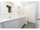 Elegant bathroom with double vanity and walk-in shower at 13477 Leaping Water Way, Astatula, FL 34705