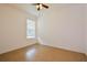 Empty bedroom with tile flooring, white walls, and a ceiling fan at 1423 Harbor Ridge Dr, Poinciana, FL 34759