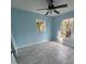 Bright bedroom with ceiling fan and new flooring at 3316 Gate Rd, Bartow, FL 33830