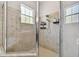 Large tiled shower with glass enclosure at 8915 Pinecrest Dr, Lakeland, FL 33809