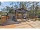 Spacious wooden deck with pergola and lounge chairs at 8915 Pinecrest Dr, Lakeland, FL 33809