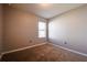 Light and airy bedroom with carpeted floor and window at 1046 Roberta Rd, Lake Wales, FL 33853