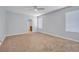 Spacious bedroom with neutral walls and carpeting at 1046 Roberta Rd, Lake Wales, FL 33853