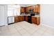 Modern kitchen featuring stainless steel appliances and wood cabinets at 1046 Roberta Rd, Lake Wales, FL 33853