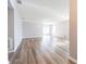 Spacious living area with wood-look flooring at 1046 Roberta Rd, Lake Wales, FL 33853