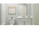 Simple bathroom with white vanity and bathtub at 1649 Teagan Ln, Winter Haven, FL 33884