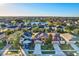 Aerial view of neighborhood with lake and houses at 2804 Polson Dr, Kissimmee, FL 34758