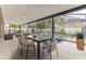Relaxing screened pool and spa with outdoor seating and dining area at 2804 Polson Dr, Kissimmee, FL 34758