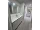 Modern bathroom with updated vanity and flooring at 6611 Hereford Dr, Lakeland, FL 33810