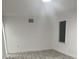 Spacious bedroom with new flooring and a window at 6611 Hereford Dr, Lakeland, FL 33810