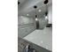 Modern kitchen featuring white shaker cabinets and quartz countertops at 6611 Hereford Dr, Lakeland, FL 33810