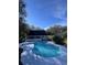 Inviting kidney-shaped pool with a large backyard at 6611 Hereford Dr, Lakeland, FL 33810