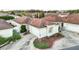 Aerial view of a single-story villa in a residential community at 17090 Se 76Th Caledonia Ter, The Villages, FL 32162