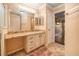 Bathroom features granite vanity and updated fixtures at 17090 Se 76Th Caledonia Ter, The Villages, FL 32162