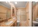 Clean bathroom with granite countertop, tub, and shower at 17090 Se 76Th Caledonia Ter, The Villages, FL 32162