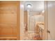 Bathroom boasts a walk-in shower,granite vanity, and closet at 17090 Se 76Th Caledonia Ter, The Villages, FL 32162