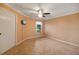 Bedroom with tile floor, window, and ceiling fan at 17090 Se 76Th Caledonia Ter, The Villages, FL 32162