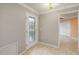 Bright entryway with tile flooring and a glass front door at 17090 Se 76Th Caledonia Ter, The Villages, FL 32162