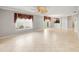 Bright and airy living room with tile flooring and natural light at 17090 Se 76Th Caledonia Ter, The Villages, FL 32162