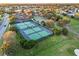 Aerial view of community tennis courts at 17090 Se 76Th Caledonia Ter, The Villages, FL 32162