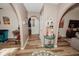 Light-filled hallway with arched doorways and decorative accents at 6241 Elm W Sq, Lakeland, FL 33813