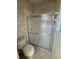 Shower stall with glass door and neutral decor at 3323 Songbird Ln, Lakeland, FL 33811