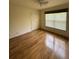 Bright bedroom with wood flooring and double door closet at 3323 Songbird Ln, Lakeland, FL 33811