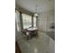 Bright breakfast nook with window and small table at 3323 Songbird Ln, Lakeland, FL 33811