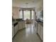 Eat-in kitchen with corner window and island at 3323 Songbird Ln, Lakeland, FL 33811