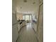 Bright kitchen with white cabinets and an island at 3323 Songbird Ln, Lakeland, FL 33811