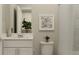 Clean bathroom with white vanity and neutral decor at 7013 Rosy Sky Ave, Orlando, FL 32829