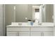 Modern bathroom with double vanity and elegant fixtures at 7018 Rosy Sky Ave, Orlando, FL 32829