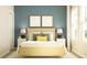 Bright bedroom with light wood bed frame and soft color palette at 7018 Rosy Sky Ave, Orlando, FL 32829