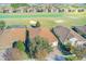 Community view with golf course and houses at 1369 Palmetto Dunes St, Davenport, FL 33896