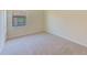 Bright bedroom featuring neutral walls and carpet at 1369 Palmetto Dunes St, Davenport, FL 33896