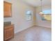 Breakfast nook with tile flooring and window views at 1369 Palmetto Dunes St, Davenport, FL 33896