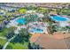 Resort-style community pool with multiple pools and a water slide at 1369 Palmetto Dunes St, Davenport, FL 33896