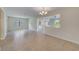 Open dining room with views of kitchen and Gathering room at 1369 Palmetto Dunes St, Davenport, FL 33896