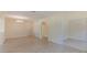 Spacious dining room with tile floors and neutral color palette at 1369 Palmetto Dunes St, Davenport, FL 33896