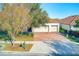 House exterior with a brick driveway and two-car garage at 1369 Palmetto Dunes St, Davenport, FL 33896