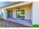 Covered patio with sliding glass doors and brick flooring at 1369 Palmetto Dunes St, Davenport, FL 33896