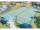 Aerial view of six well-maintained pickleball courts with surrounding fencing at 1369 Palmetto Dunes St, Davenport, FL 33896