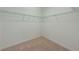 Spacious walk-in closet with wire shelving, providing ample storage at 1369 Palmetto Dunes St, Davenport, FL 33896