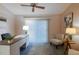 Home office with desk, chairs, and sliding glass doors at 1074 Canary S Cir, Lakeland, FL 33809