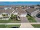 Modern single-Gathering homes in a planned community with landscaped yards and paver driveways at 1767 Bee Nice Dr, Kissimmee, FL 34744
