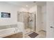 Spa-like bathroom with soaking tub and a separate shower at 1767 Bee Nice Dr, Kissimmee, FL 34744