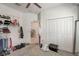 Organized bedroom/closet with plenty of storage for clothes, shoes, and accessories at 1767 Bee Nice Dr, Kissimmee, FL 34744