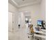 Home office or den area with a desk, computer, and a view down the hallway at 1767 Bee Nice Dr, Kissimmee, FL 34744