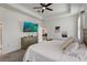 Main bedroom featuring a wall-mounted TV and a dresser at 1767 Bee Nice Dr, Kissimmee, FL 34744